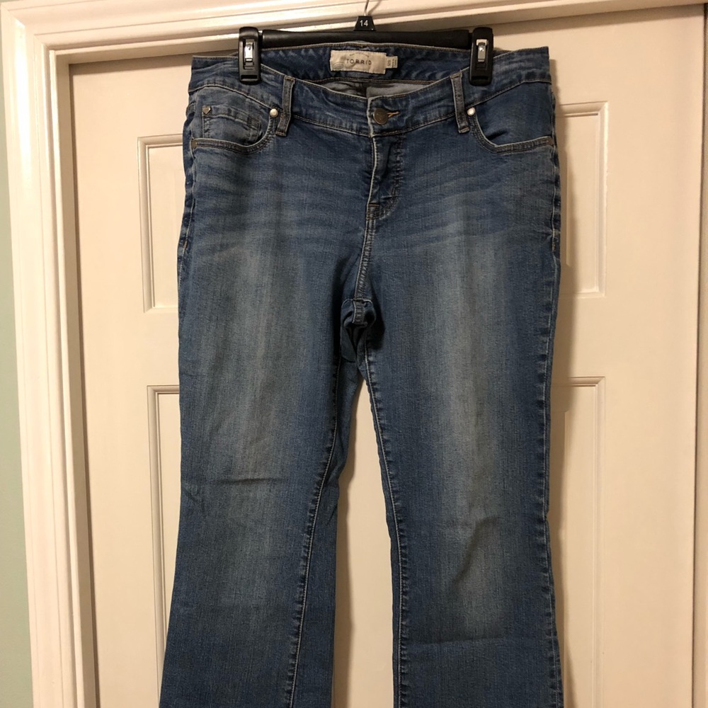 Torrid, medium wash, bootcut jeans.